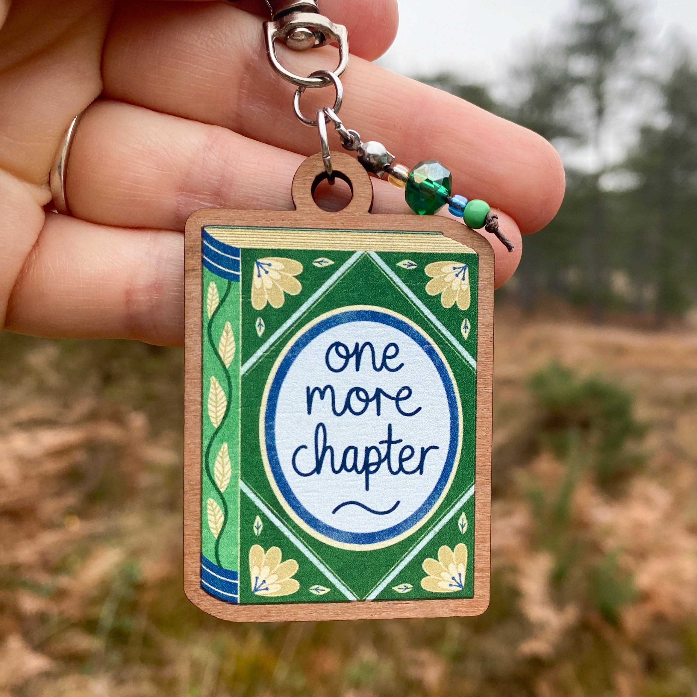 One More Chapter Keyring